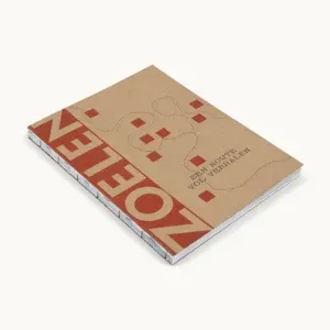 Softcover boek met zichtbare katernen en open rug – voorbeeld van ambachtelijk gebonden boek.