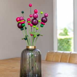 Paars met fuchsia houten boeket in een glazen vaas