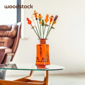 houten boeket met 9 stelen in retro stijl jaren 60 en 70 in een vintage oranje vaas West Germany